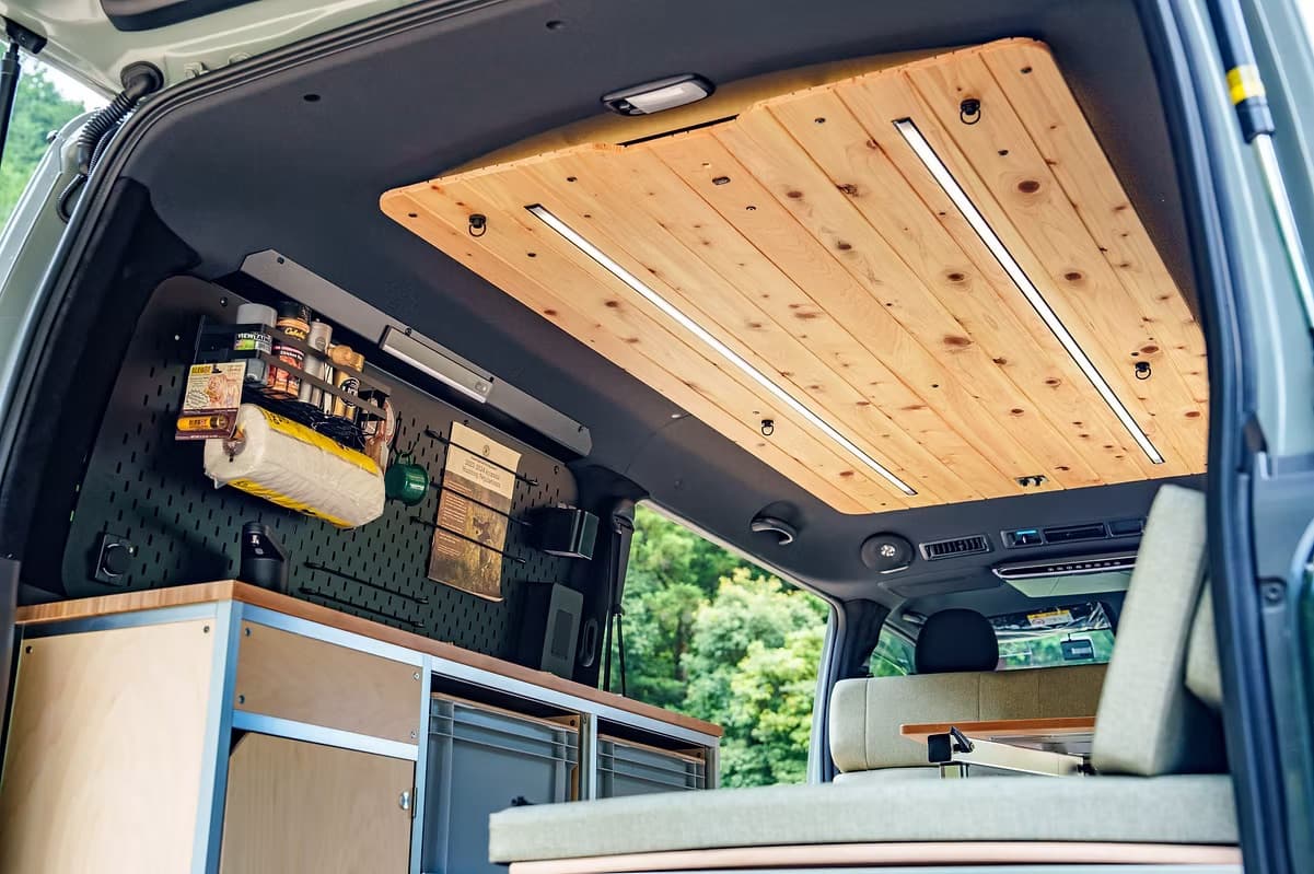 Bare Camper Build modular interior — cypress ceiling, aluminium frame, pegboard storage