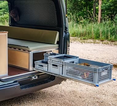 Euro containers sliding out from rear — stackable modular storage