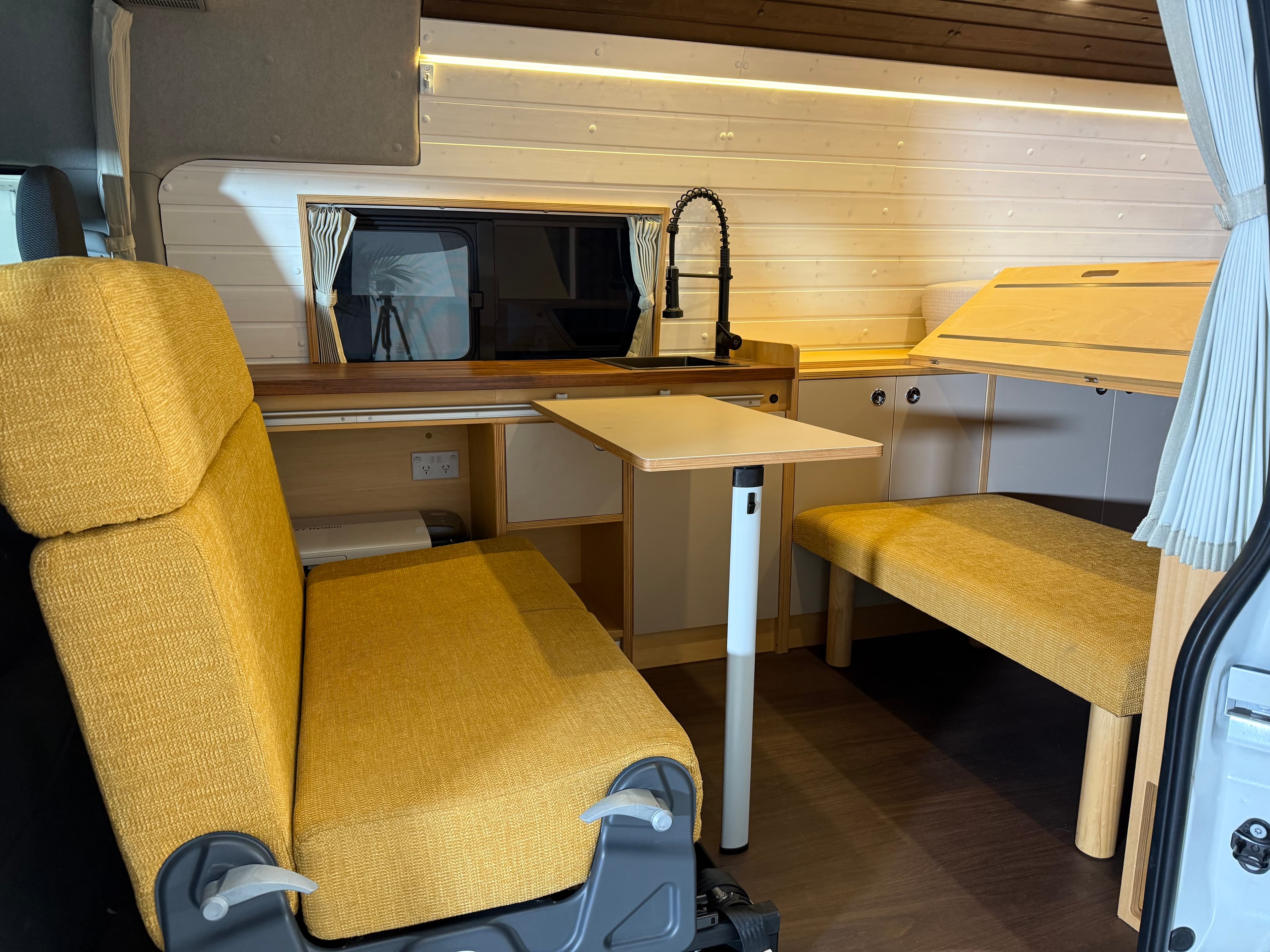 KUMA-Q galley kitchen with walnut countertop