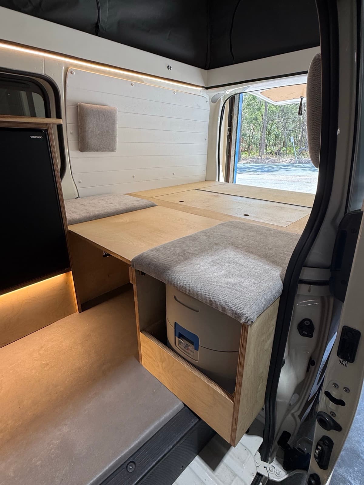 MANA seating area with toilet compartment